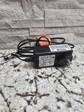 Razor Ql-09009-b24000600h Oem E100 Glow Charger 24v 600ma