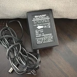Sharp Ac Adapter EA-23E,8.5V.350MA. Fixed Price $10.49.