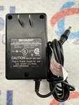 Sharp, ADP-0042, Ac Adapter, Output: 12VDC, 2A. Fixed Price $5.24.