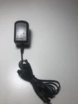 Ac/dc Power Adaptor Supply MODEL:RR-28-0600100D 6V. Fixed Price $10.00.